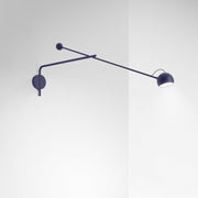applique-murale-a-bras-en-acier-bleu-ixa-artemide-1