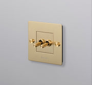 1g-double-toggle-switch-brass-buster-punch-1