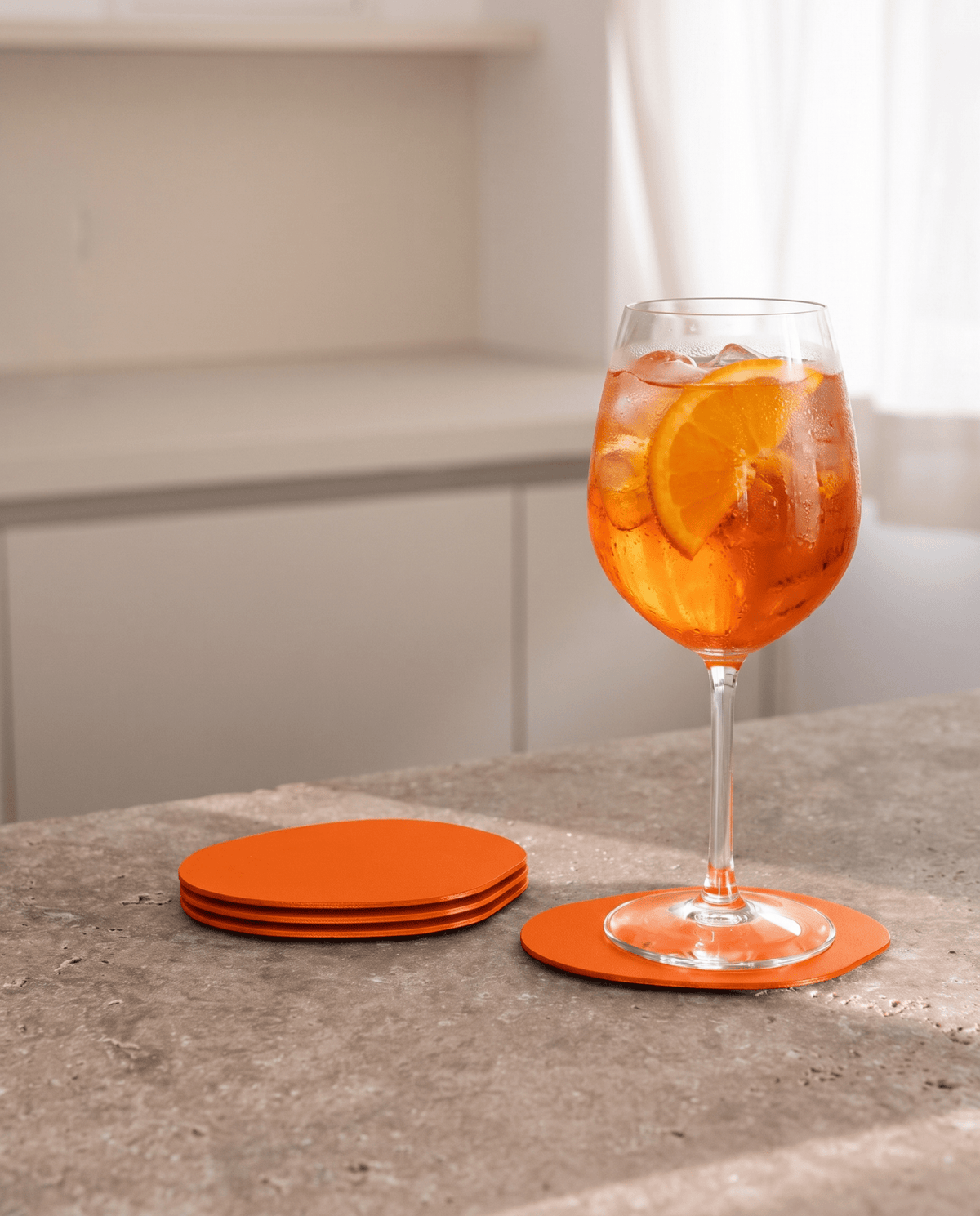 4 sous verres organiques en acier orange sprizz 10x2cm Kiva - Metallbude - The Cool Republic