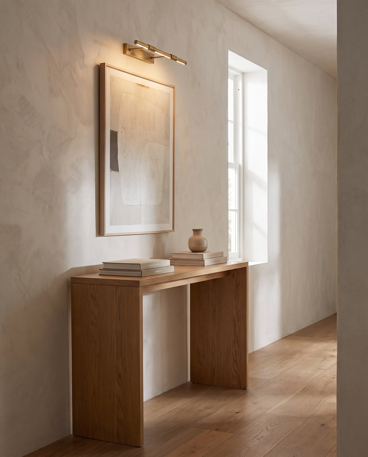 Applique de tableau en laiton laiton vieilli 60x7cm Melbourne - Hudson Valley Lighting en situation