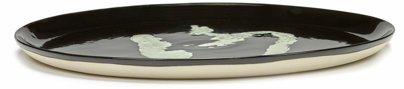 Assiette de service noir avec poivron blanc Feast - Serax - The Cool Republic