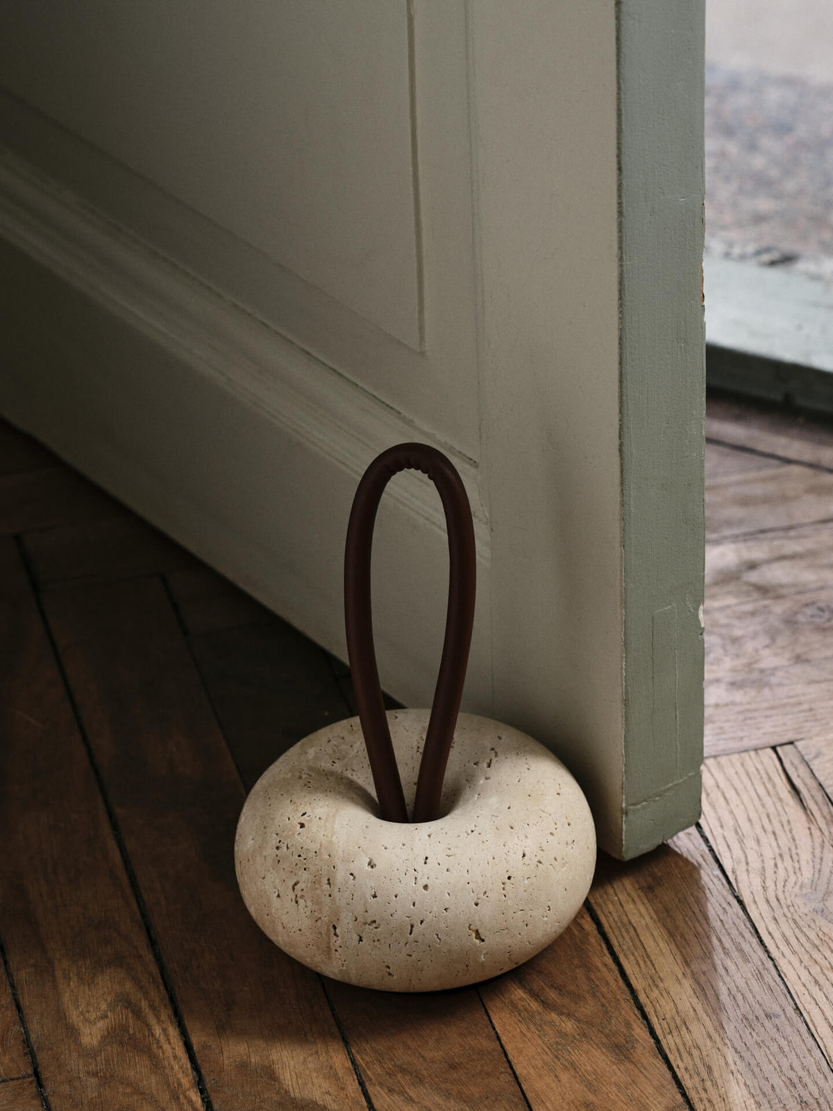 Round door stopper in beige travertine 14 cm Wa - Ferm Living - The Cool Republic