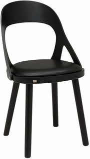Chaise en chêne noir et coussin en cuir reconstitué noir Colibri - Hans k - The Cool Republic