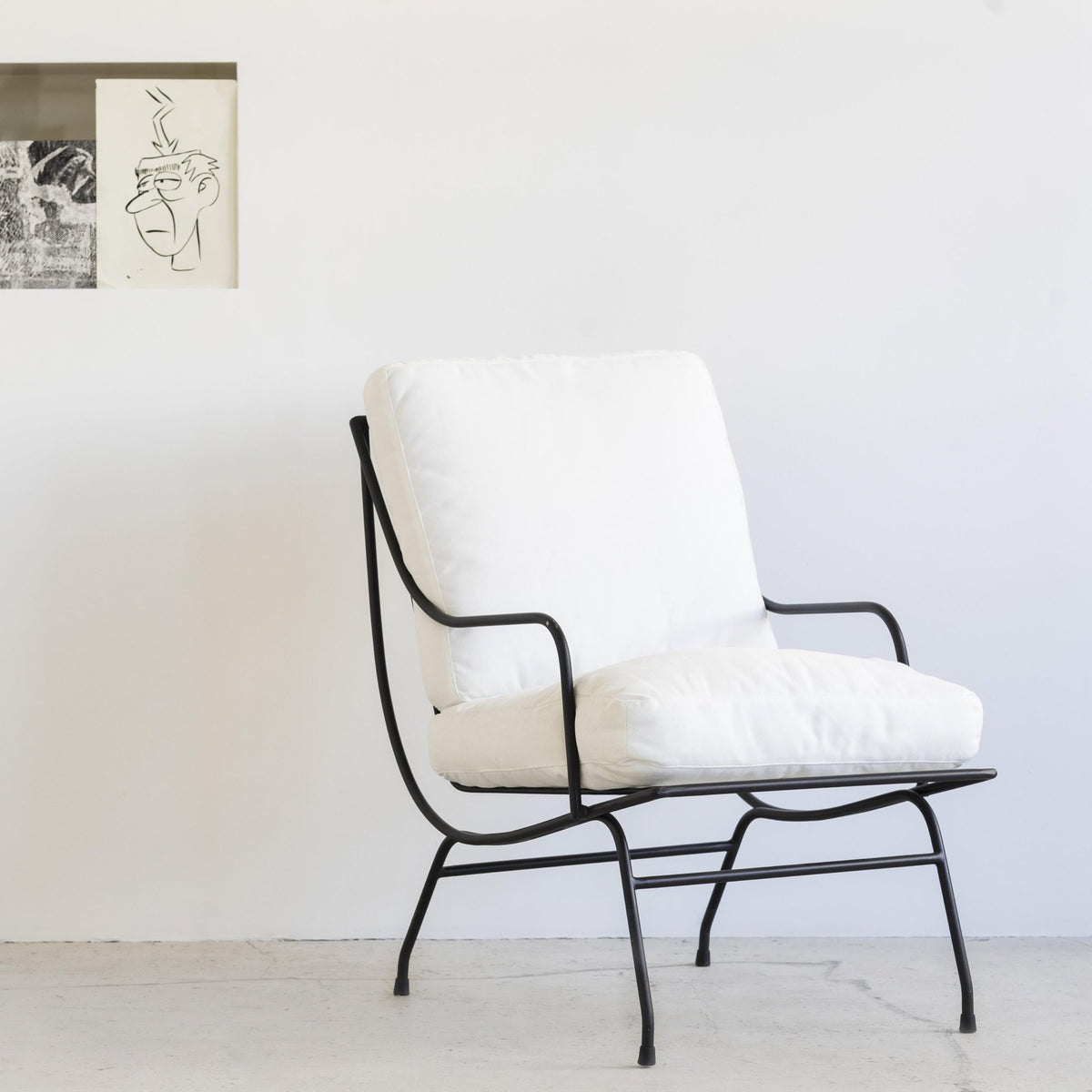 Fauteuil en acier noir avec coussin Stresa - Serax - The Cool Republic