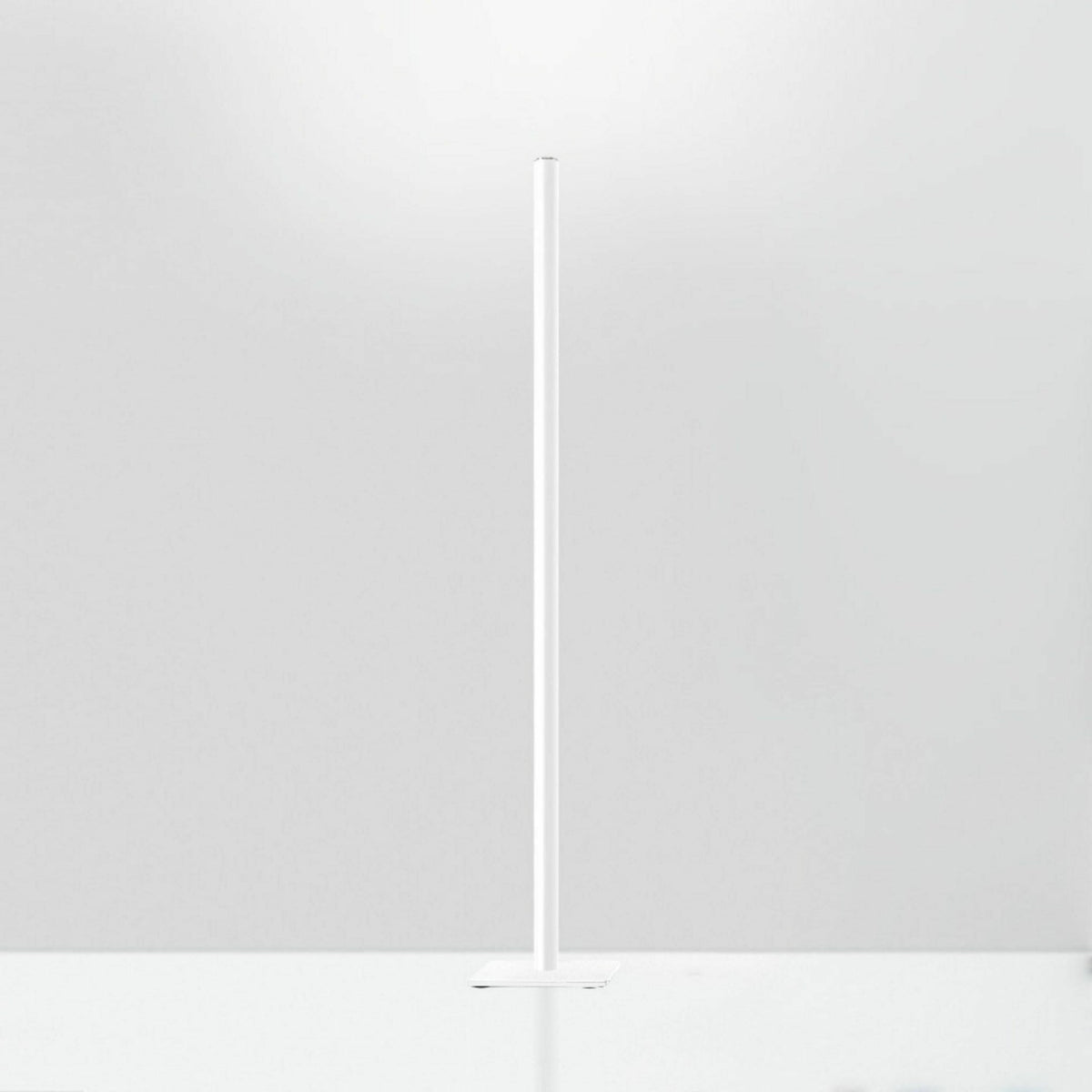 White aluminum floor lamp Mini Ilio - Artemide - The Cool Republic