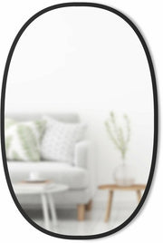 Miroir mural ovale en bois MDF noir 91 x 61 cm Hub - Umbra - The Cool Republic