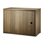Walnut pedestal with swing door - String