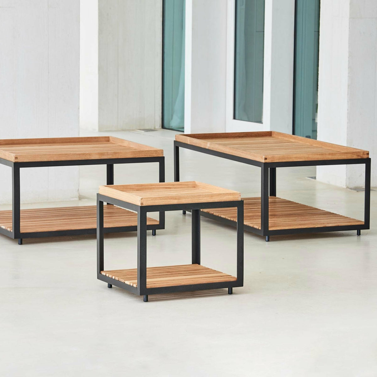 Table basse en teck et cadre noir 122x62 cm Level - Cane-Line - The Cool Republic