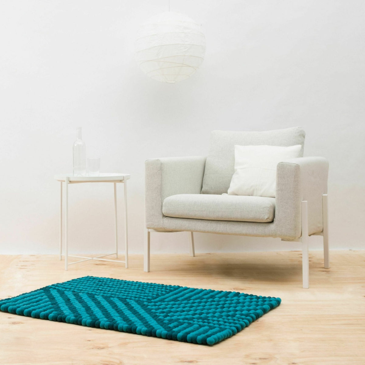 Tapis à boules de feutre turquoise 70x100 cm Weave - myfelt - The Cool Republic