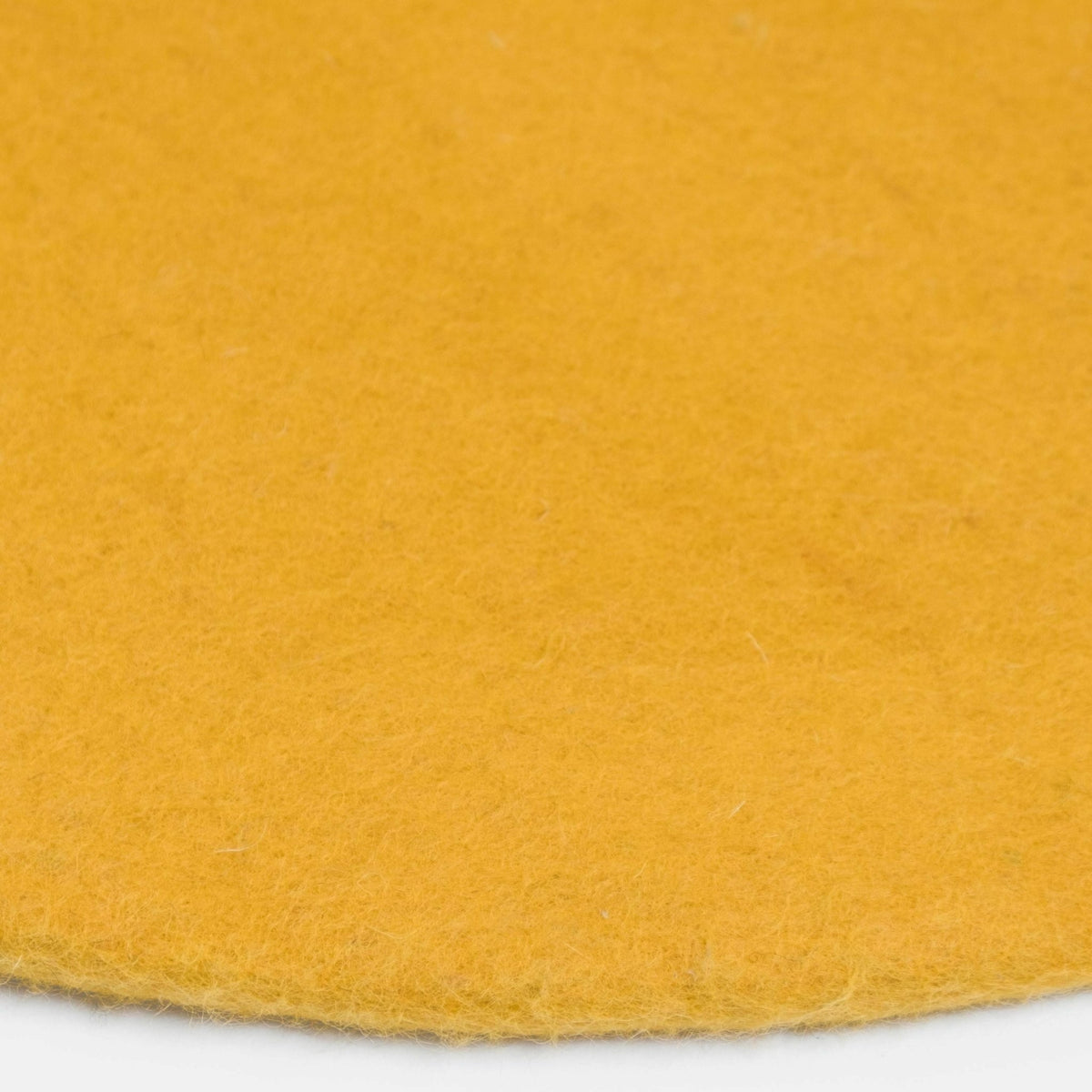 Tapis rond en laine moutarde 70 cm Klara - myfelt - The Cool Republic